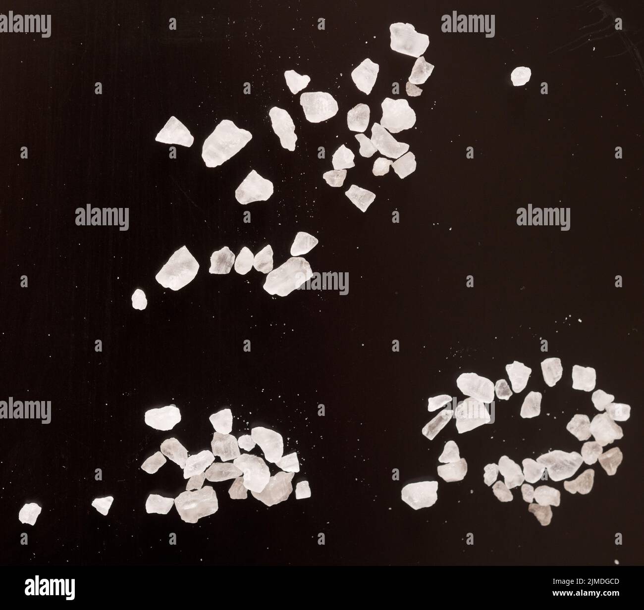 Salz auf Schwarz Stockfoto