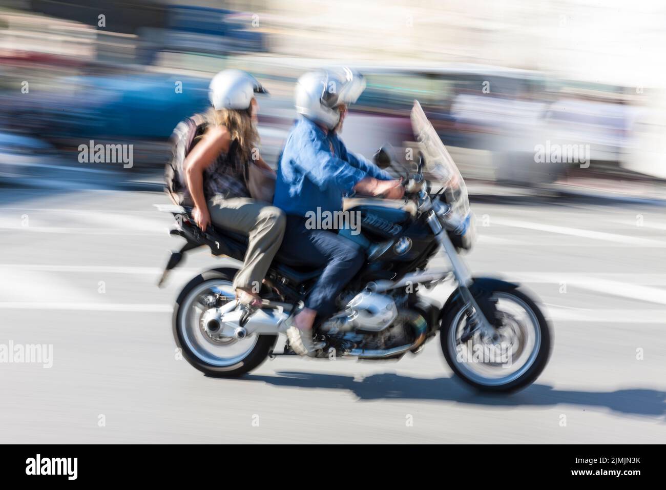 Motorroller-Fahrer bei Stockfoto