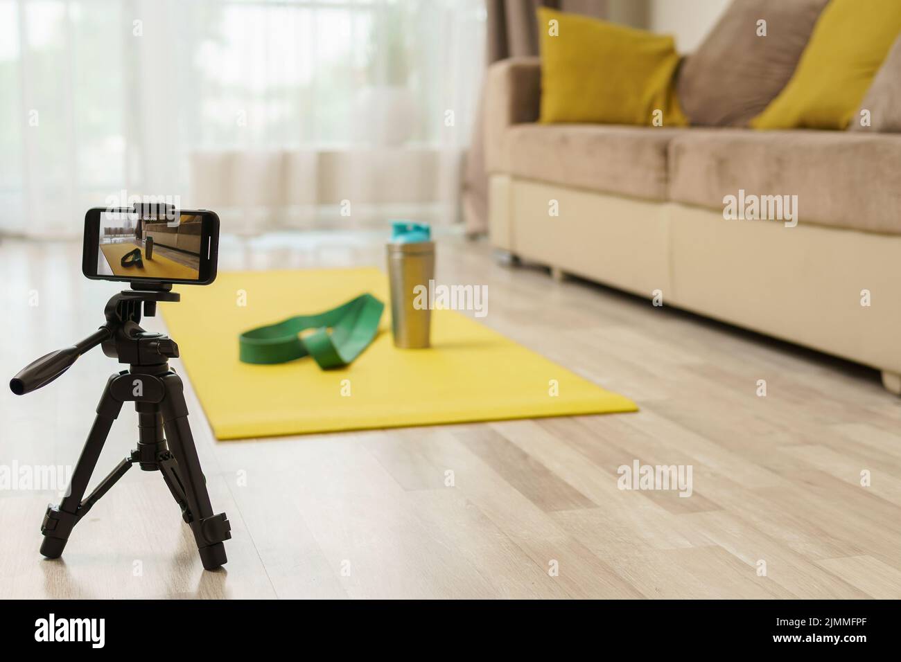 Konzepte von Online-Fitnesstraining, Ferntraining oder Vlogging Stockfoto