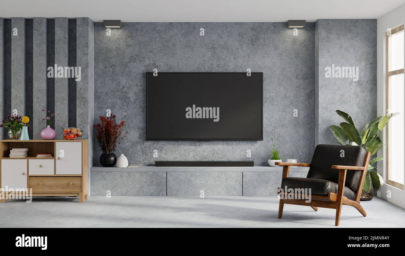 Beton-tv-Schrank im Wohnzimmer mit Ledersessel und Dekoration minimal.3D Rendering Stockfoto