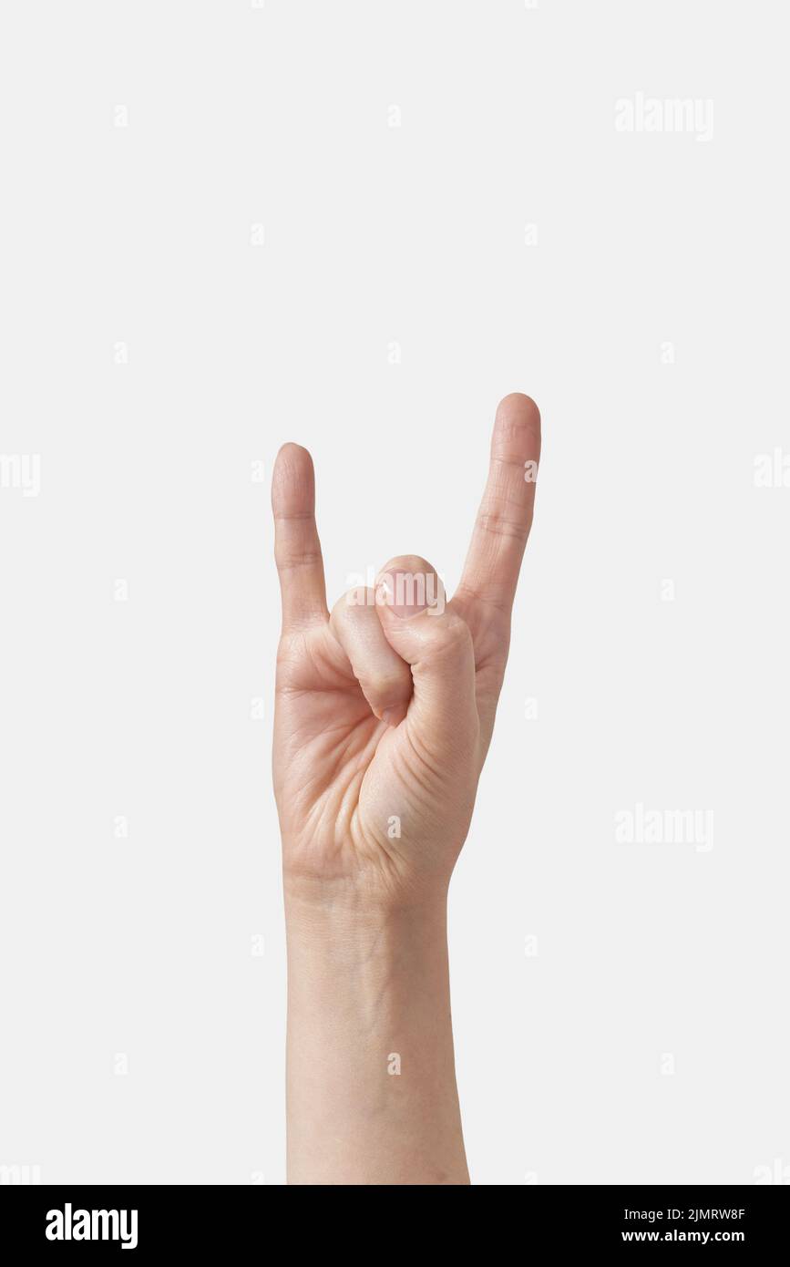 Weibliche Hand Rock Geste isoliert auf weiß Stockfoto