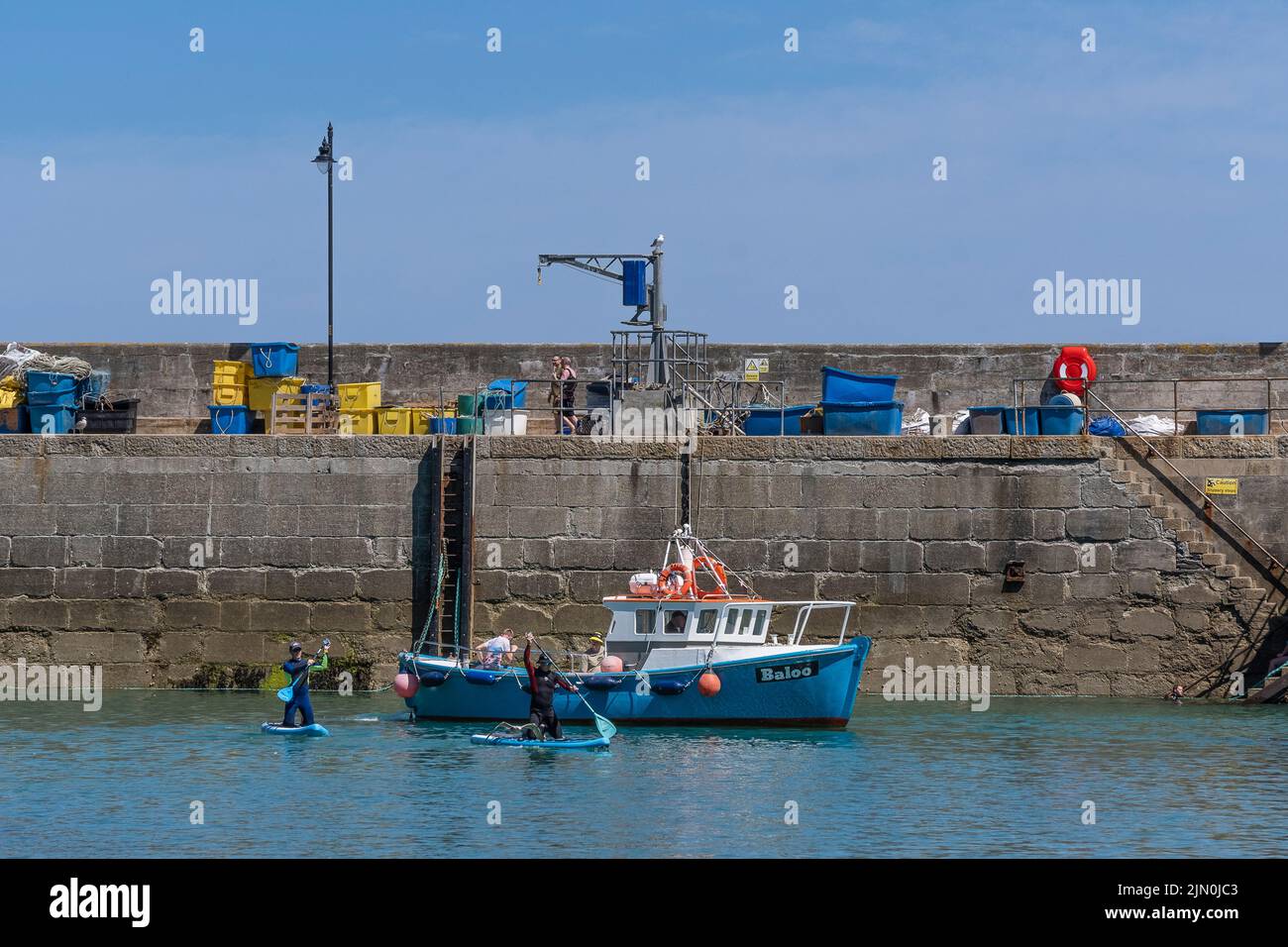 Baloo ein Angel- und Vergnügungsboot, das in Newquay Harbour in Cornwall in England im Vereinigten Königreich festgemacht hat. Stockfoto