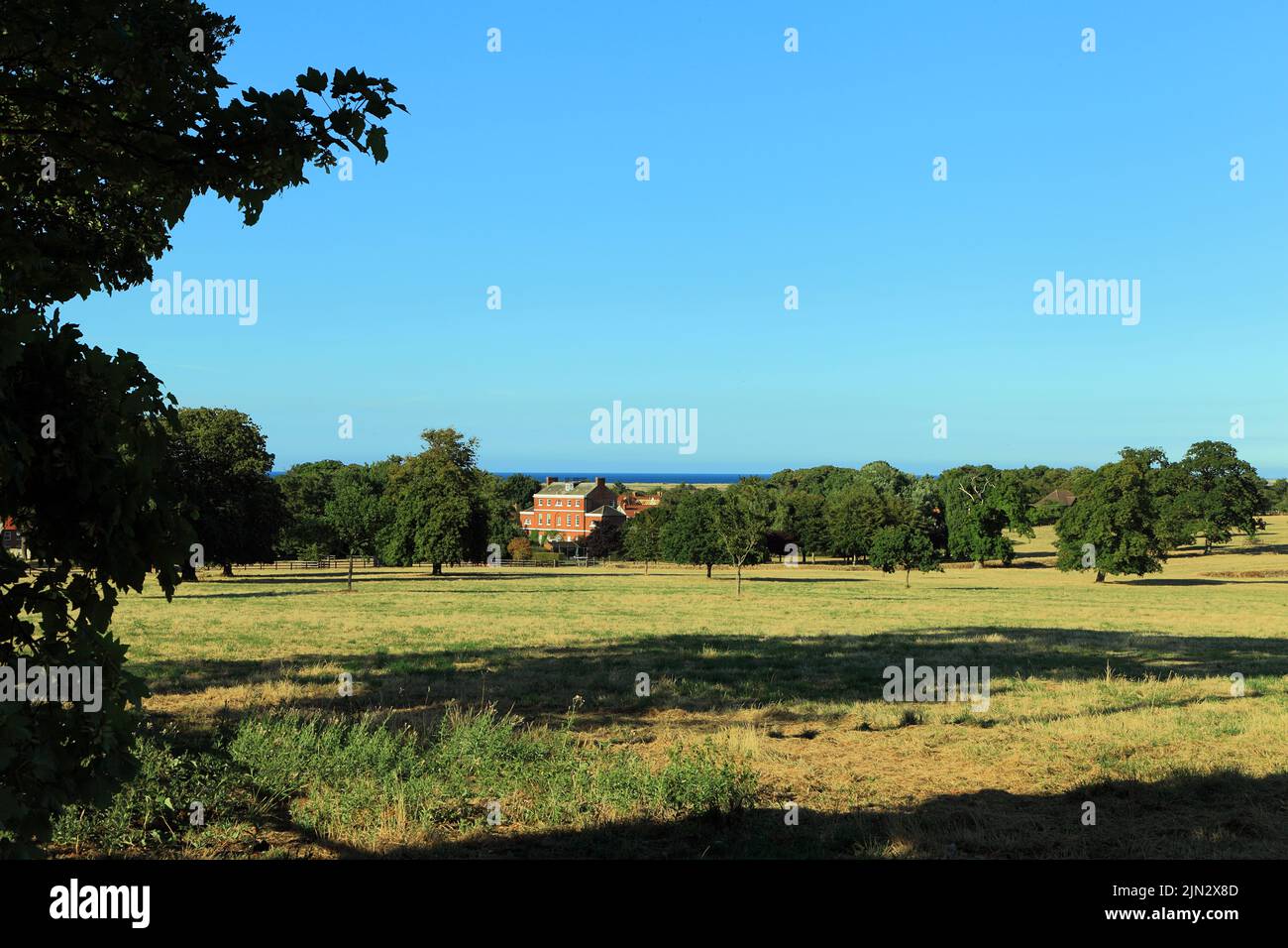 Die Halle, Parkland, Nordsee, Thornham, Norfolk, Herrenhaus aus dem 18.. Jahrhundert Stockfoto