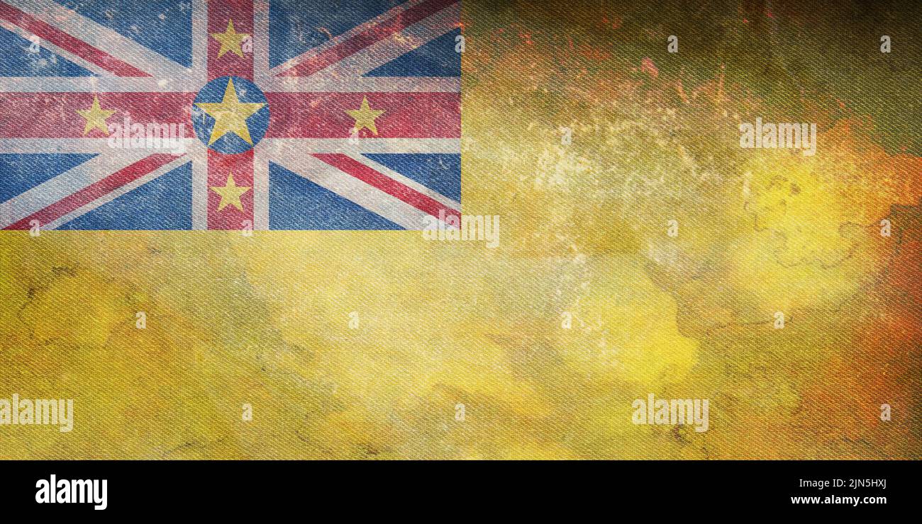 Draufsicht auf die Retro-Flagge Niue Neuseeland mit Grunge-Textur. Neuseeland Reise und patriotische Konzept. Kein Fahnenmast. Ebenenlayout, Design. Flag-Backgroun Stockfoto