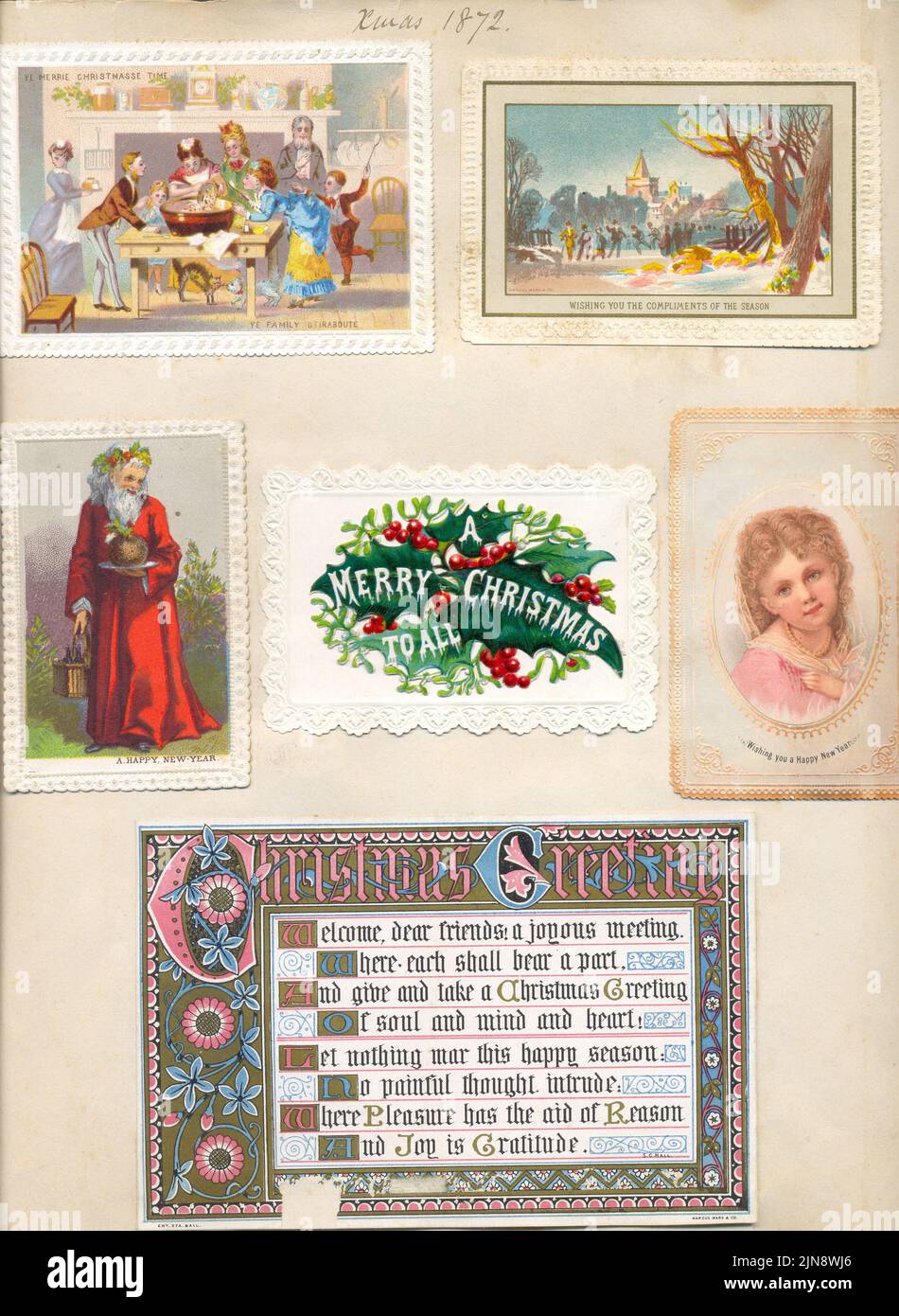 Typische viktorianische Albumseite mit Weihnachtskarten 1872 Stockfoto