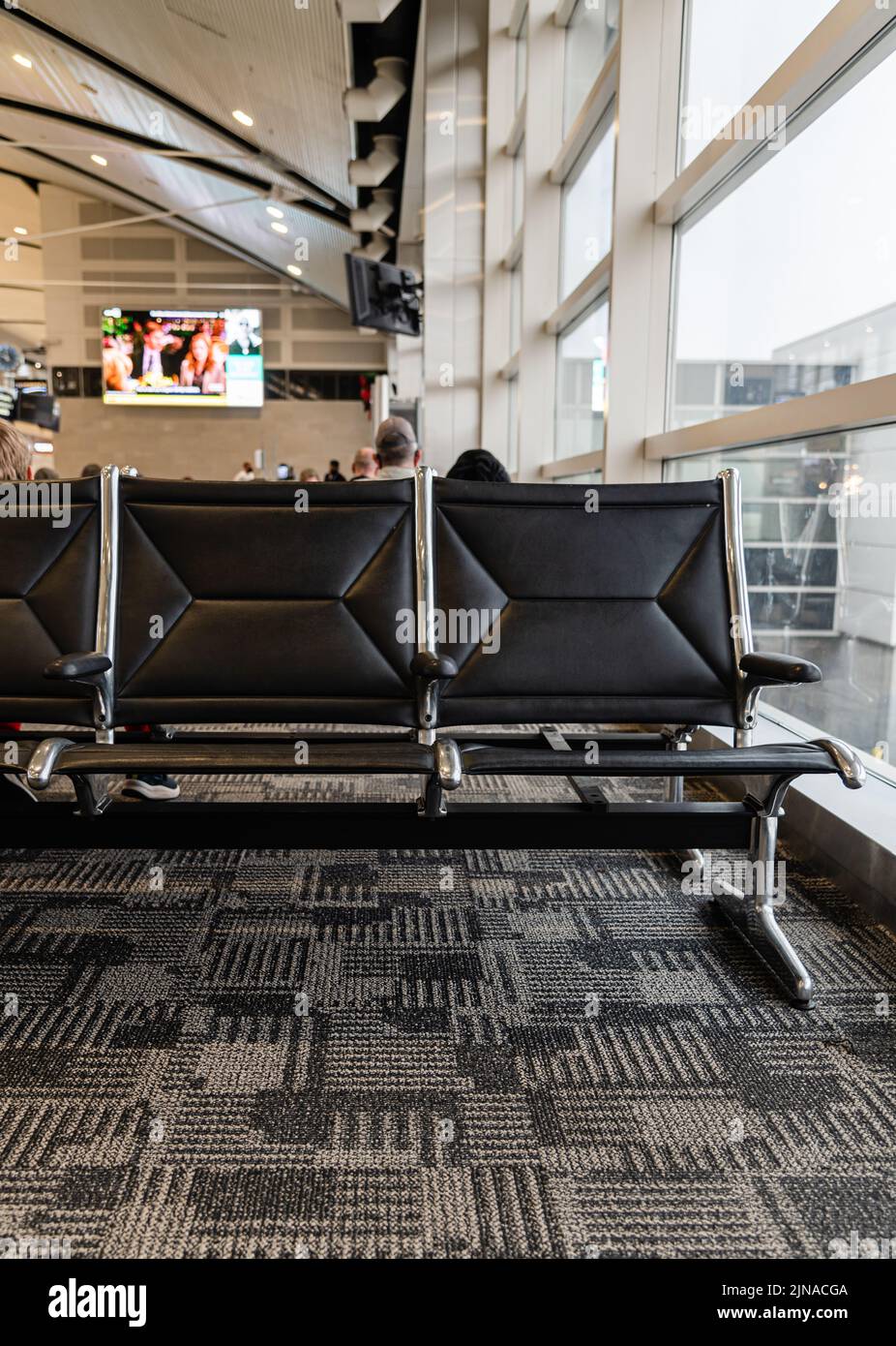 Leere Sitze an einem Flughafenterminal im Detroit Metro Airport Stockfoto