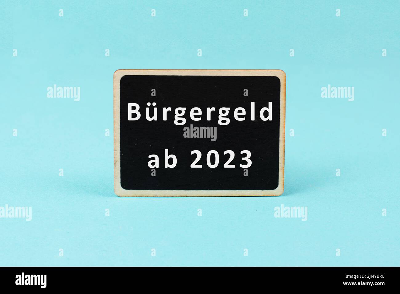 Das deutsche Wort für Bürgergeld von 2023 steht auf einem Papier, neues finanzielles Hilfesystem für Arbeitslosigkeit in Deutschland, soziale Frage Stockfoto