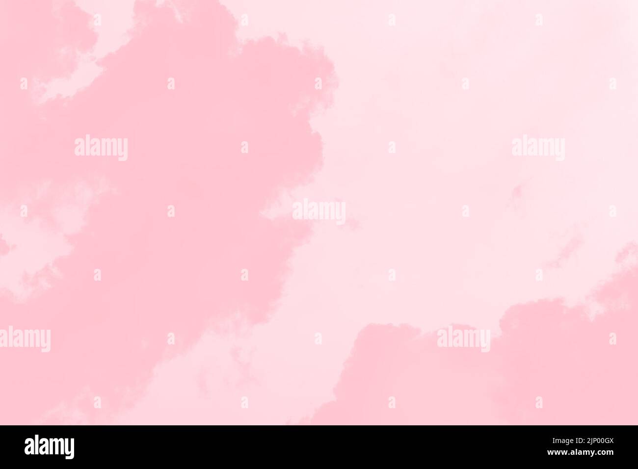 Rosa Wolken auf einem hellrosa Himmel Hintergrund Stockfoto