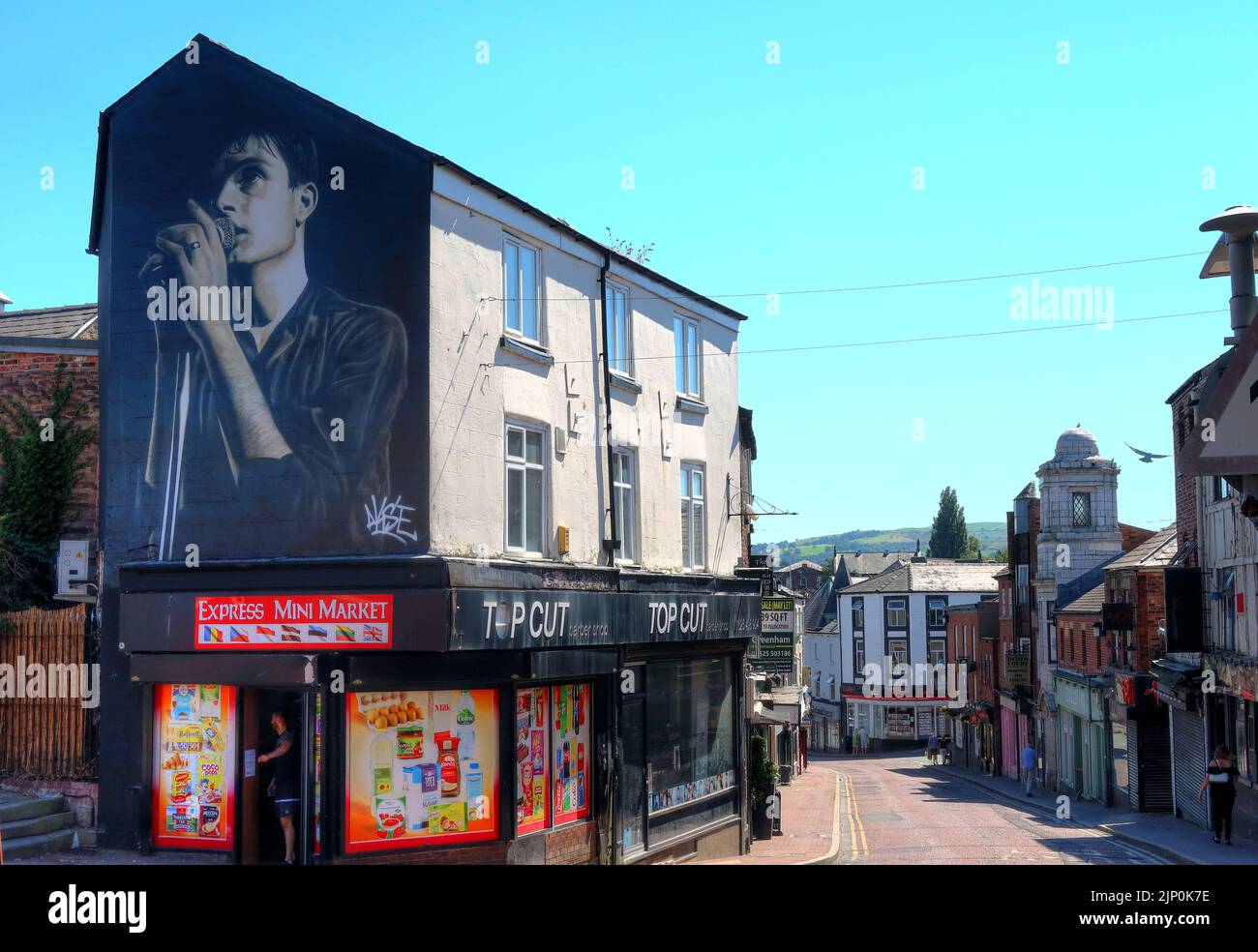 Ian Curtis, Sänger von Joy Division Wandbild von Aske, Straßenkünstler aus Manchester, Mill Street, Macclesfield, Cheshire, ENGLAND, GROSSBRITANNIEN,SK11 6NN Stockfoto