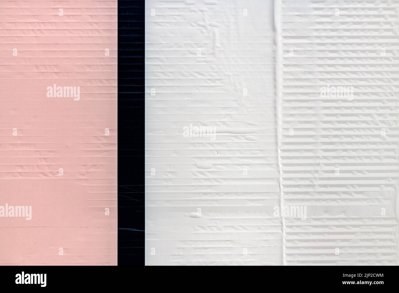 Werbeposterpapier als Kopierfläche und Hintergrund - rosa schwarz-weiße Farbe Stockfoto