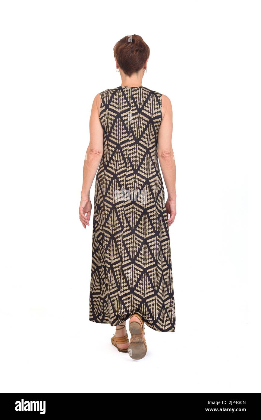 Rückansicht einer Frau mittleren Alters, die auf weißem Hintergrund läuft Stockfoto