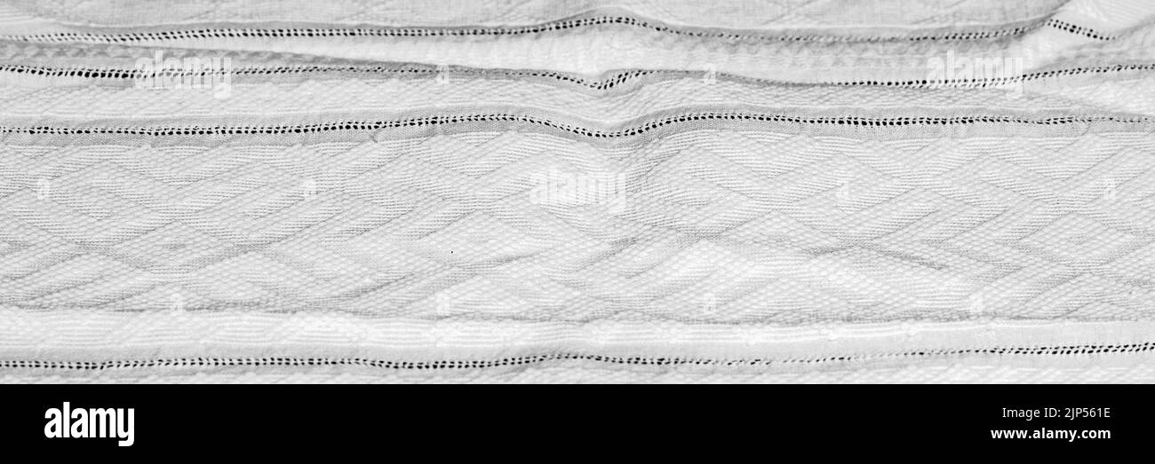 Textiler Hintergrund mit weißer Tischdecke. Textur von alten Leinen Leinwand handgefertigt. Speicherplatz kopieren. Platz für Essen und Trinken. Restaurant, Menü Stockfoto