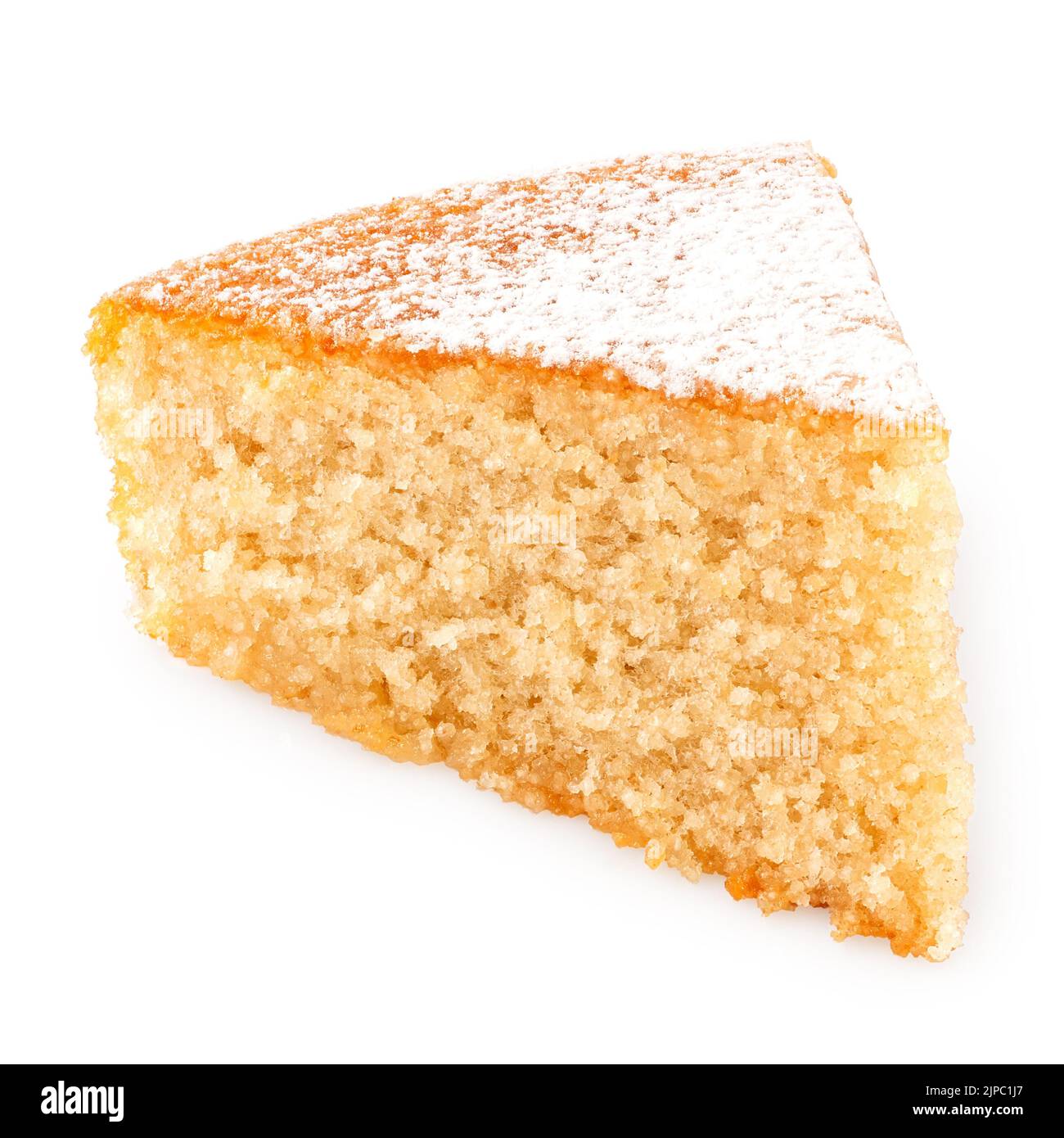 Keil von Zitronenschwamm Kuchen mit Puderzucker Belag isoliert auf weiß. Stockfoto