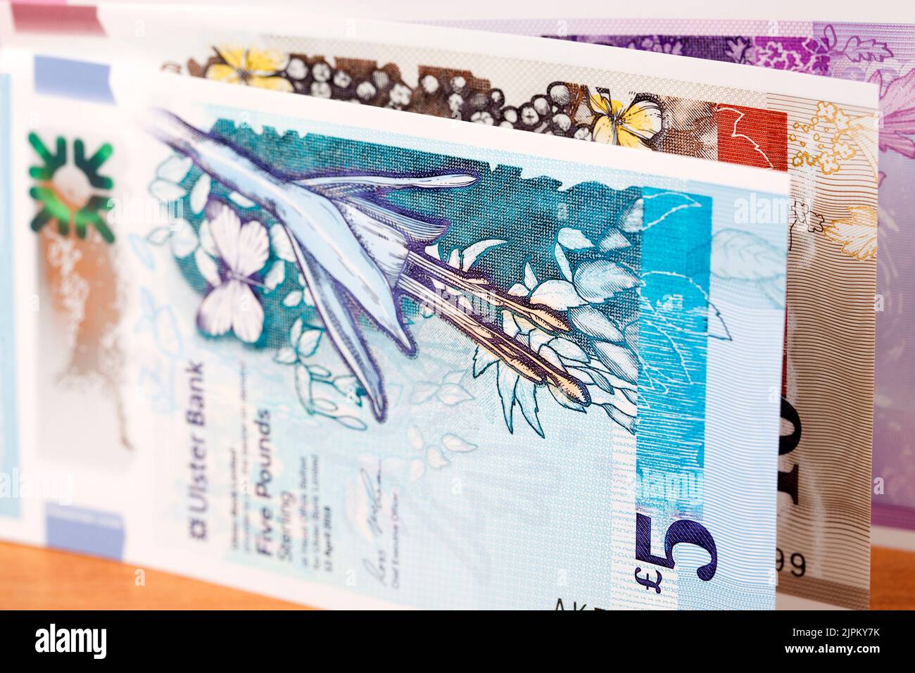 Irisches Geld - Pfund ein geschäftlicher Hintergrund Stockfoto