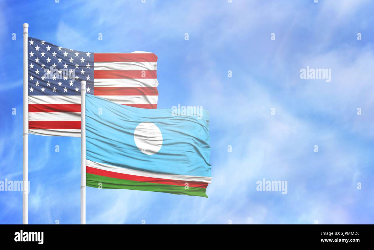 Schwenkende amerikanische Flagge und Flagge der Republik Sakha. Stockfoto