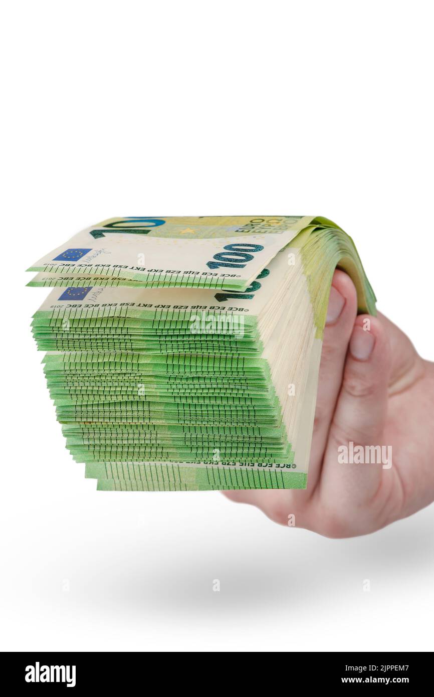 Stapel Geld in der Hand isoliert auf weißem Hintergrund. 100 Euro-Banknoten in der Hand eines Mannes. Ein Mann hält seine Hand mit einem Stapel von Banknoten als ein Stockfoto