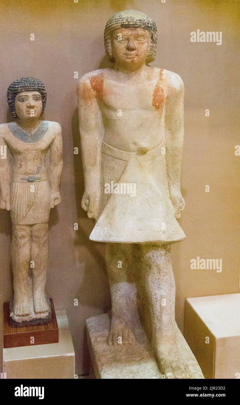 Kairo, Ägyptisches Museum, Statuen von Kanakht und seiner Familie, in Kalkstein, aus Gizeh. Stockfoto