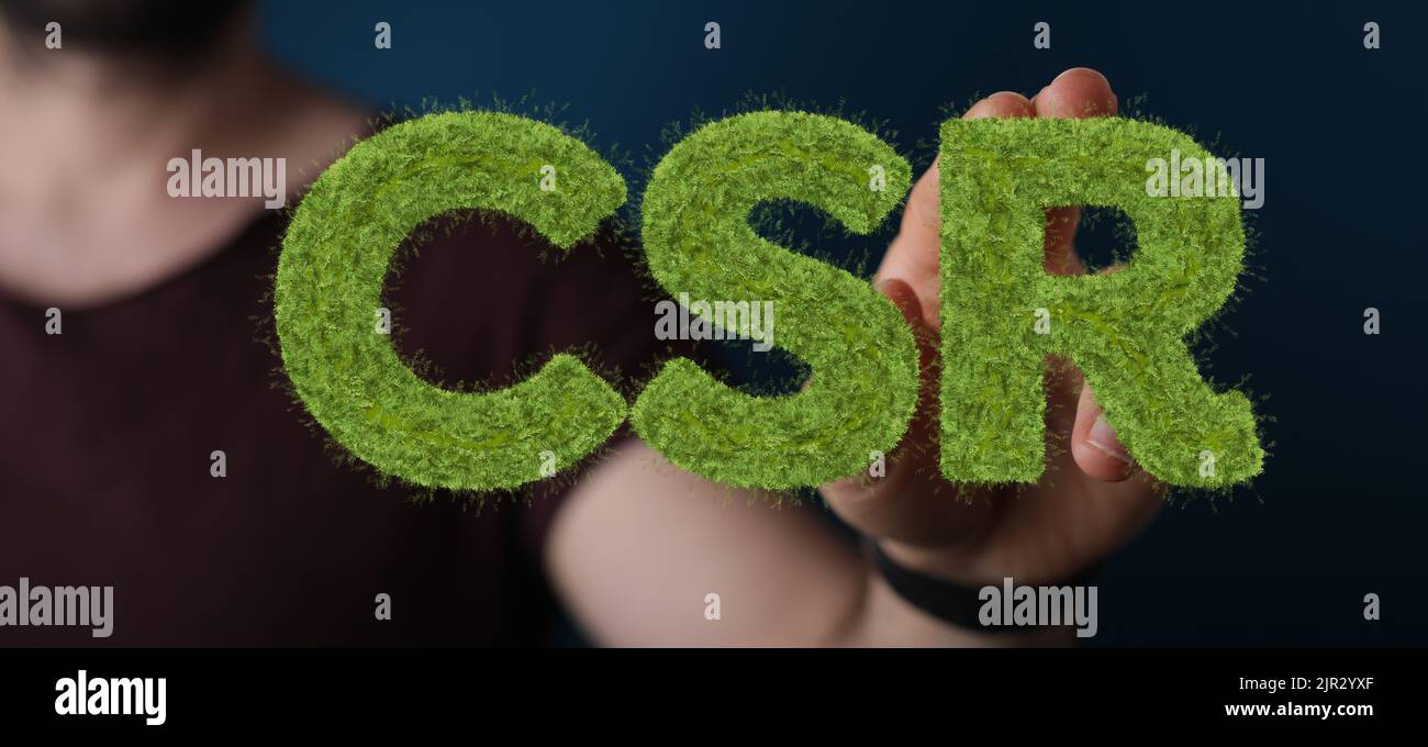 Eine 3D Render CSR-Buchstaben in Grün mit einer männlichen Hand in einem verschwommenen Hintergrund Stockfoto