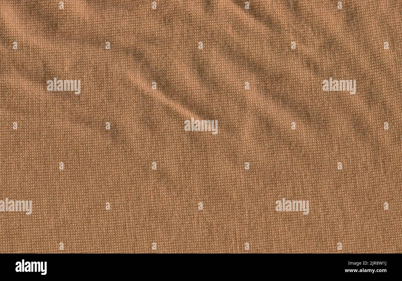 Gestrickter strukturierter brauner brauner Hintergrund aus kastanienfarben Schöne olivbraune Vermillion Stoffstruktur. Stockfoto