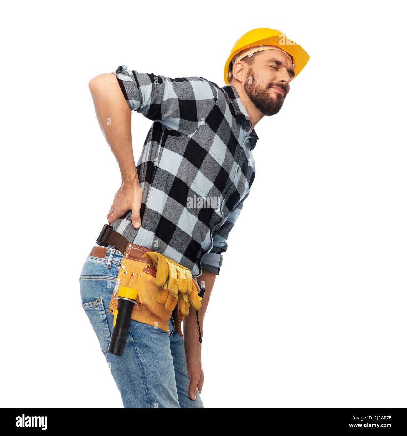 Männlicher Arbeiter oder Baumeister mit Rückenschmerzen Stockfoto