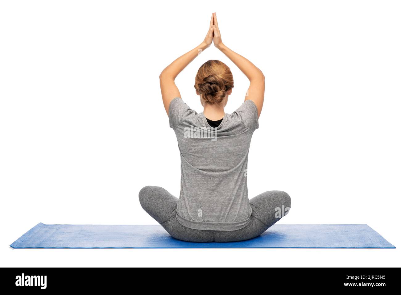 Frau, die Yoga in Lotushaltung macht Stockfoto