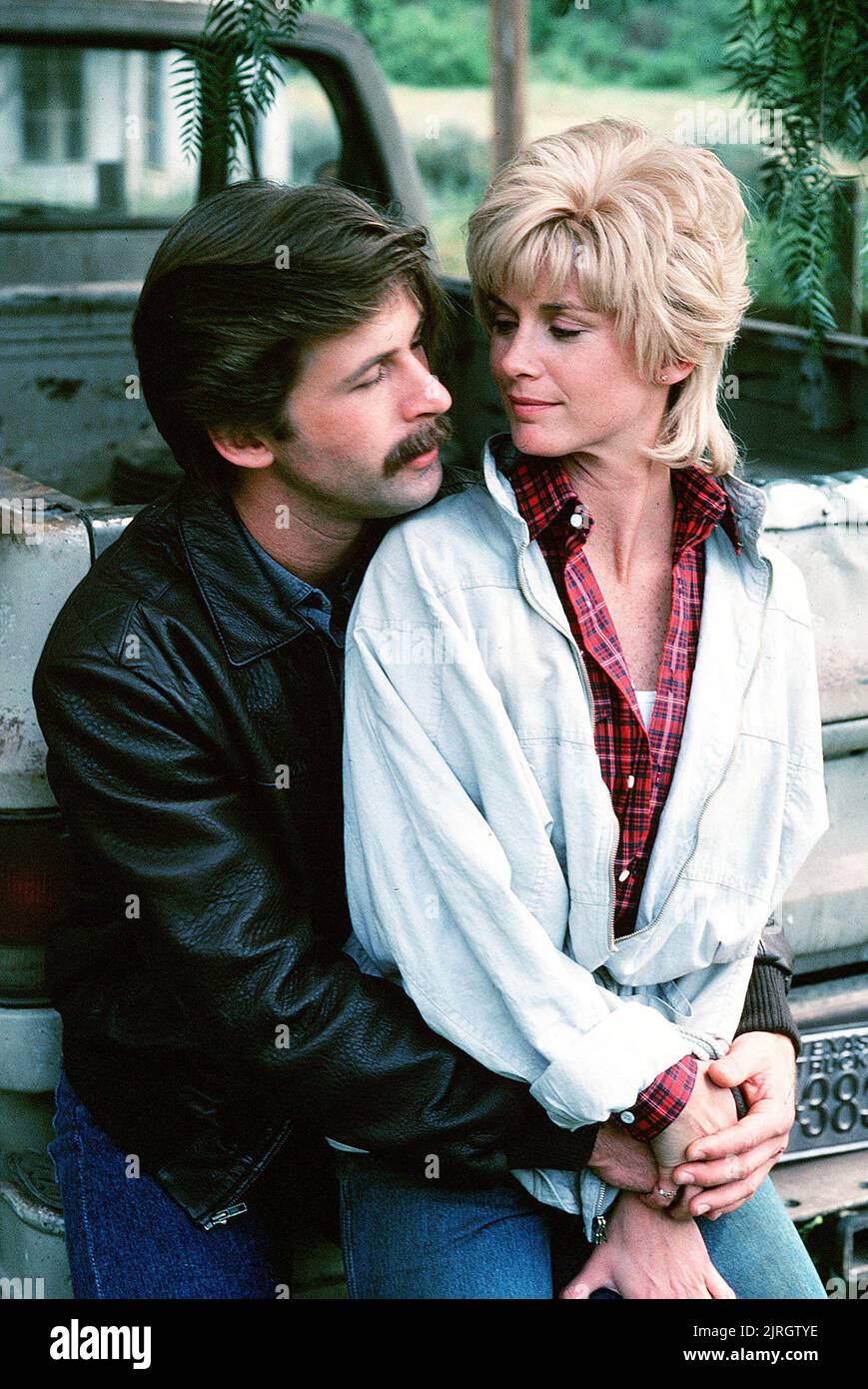 ALEC BALDWIN, STEPHANIE ZIMBALIST, LIEBE AUF DER FLUCHT, 1985 Stockfoto