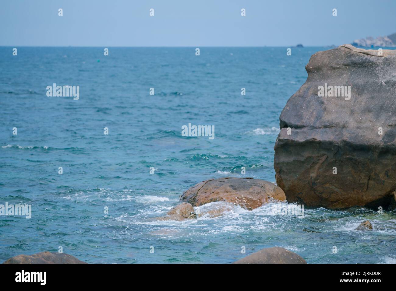 Liebesgeschichte von Fels und Meer Stockfoto