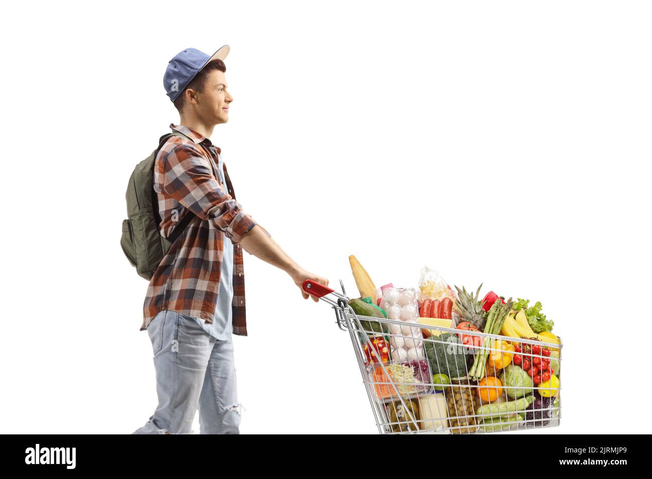 Student mit Essen in einem Einkaufswagen isoliert auf weißem Hintergrund Stockfoto