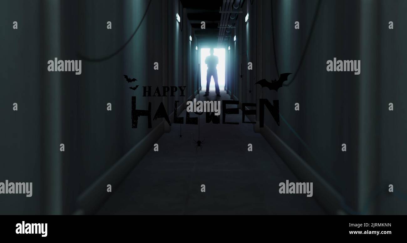 Digitale Composite-Bild der Silhouette Mann im Korridor mit glücklichen halloween-Text stehen Stockfoto