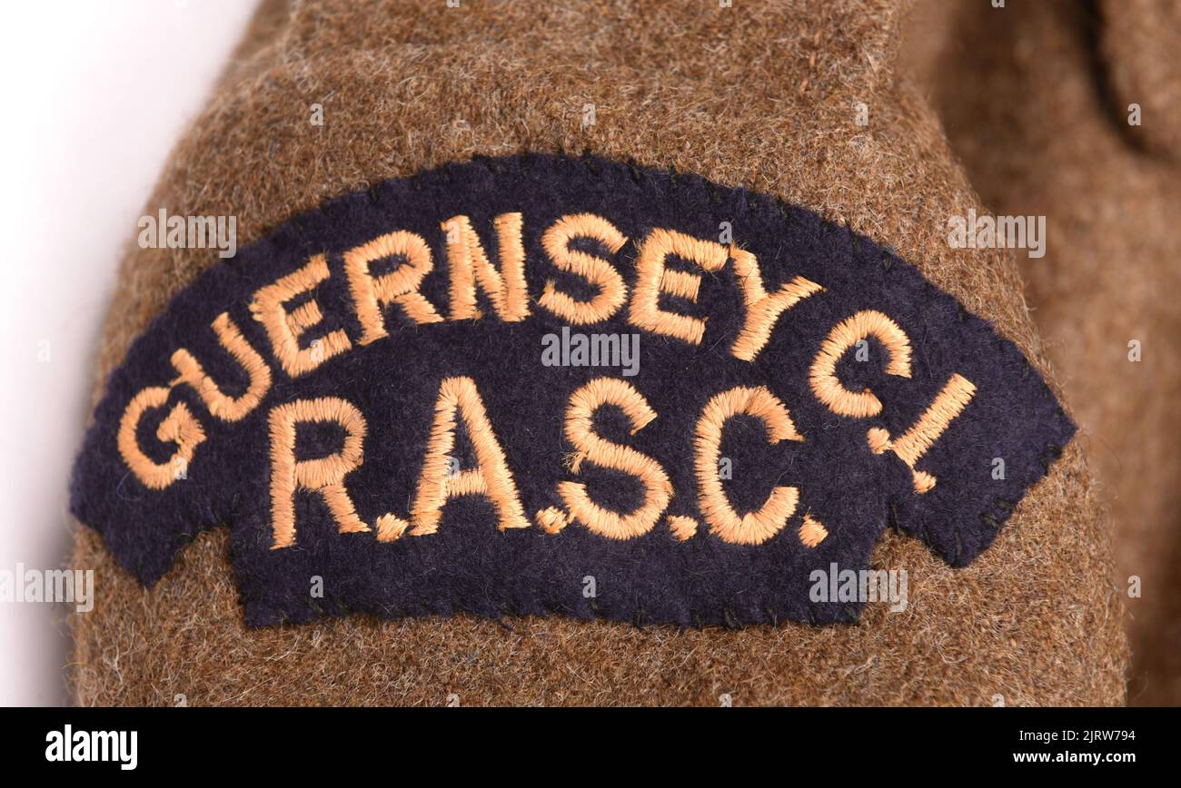 Guernsey Channel Islands RASC gewebtes Schulterabzeichen aus dem Zweiten Weltkrieg Stockfoto