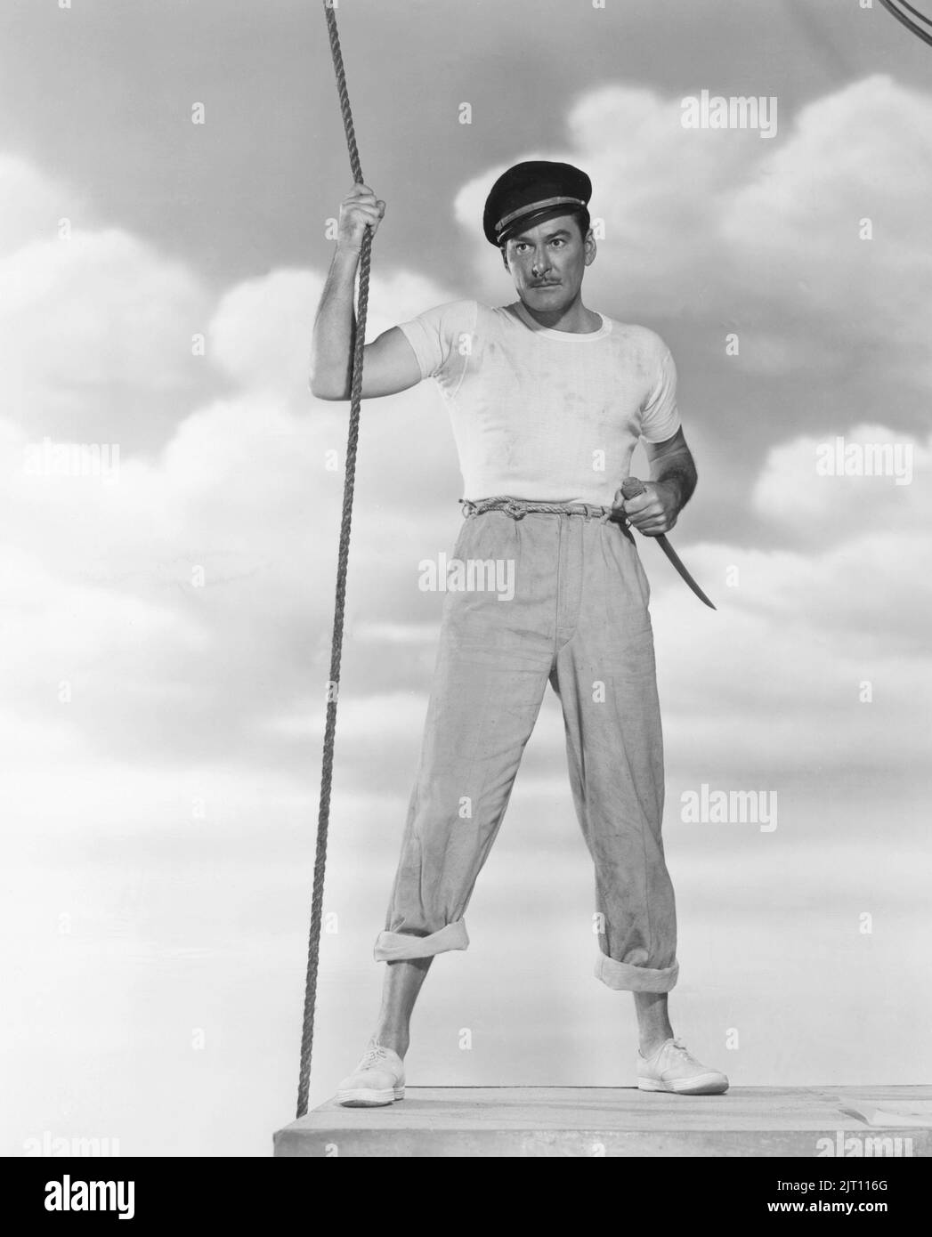 Errol Flynn. Australisch-amerikanischer Schauspieler. 20. juni 1909 - 14. oktober 1959. Während des Goldenen Zeitalters Hollywoods, das für seine romantischen Swashbuckler-Rollen bekannt ist, erlangte er weltweiten Ruhm. Abgebildet in der Hauptrolle im Film Adventures of Captain Fabian aus dem Jahr 1951. Stockfoto