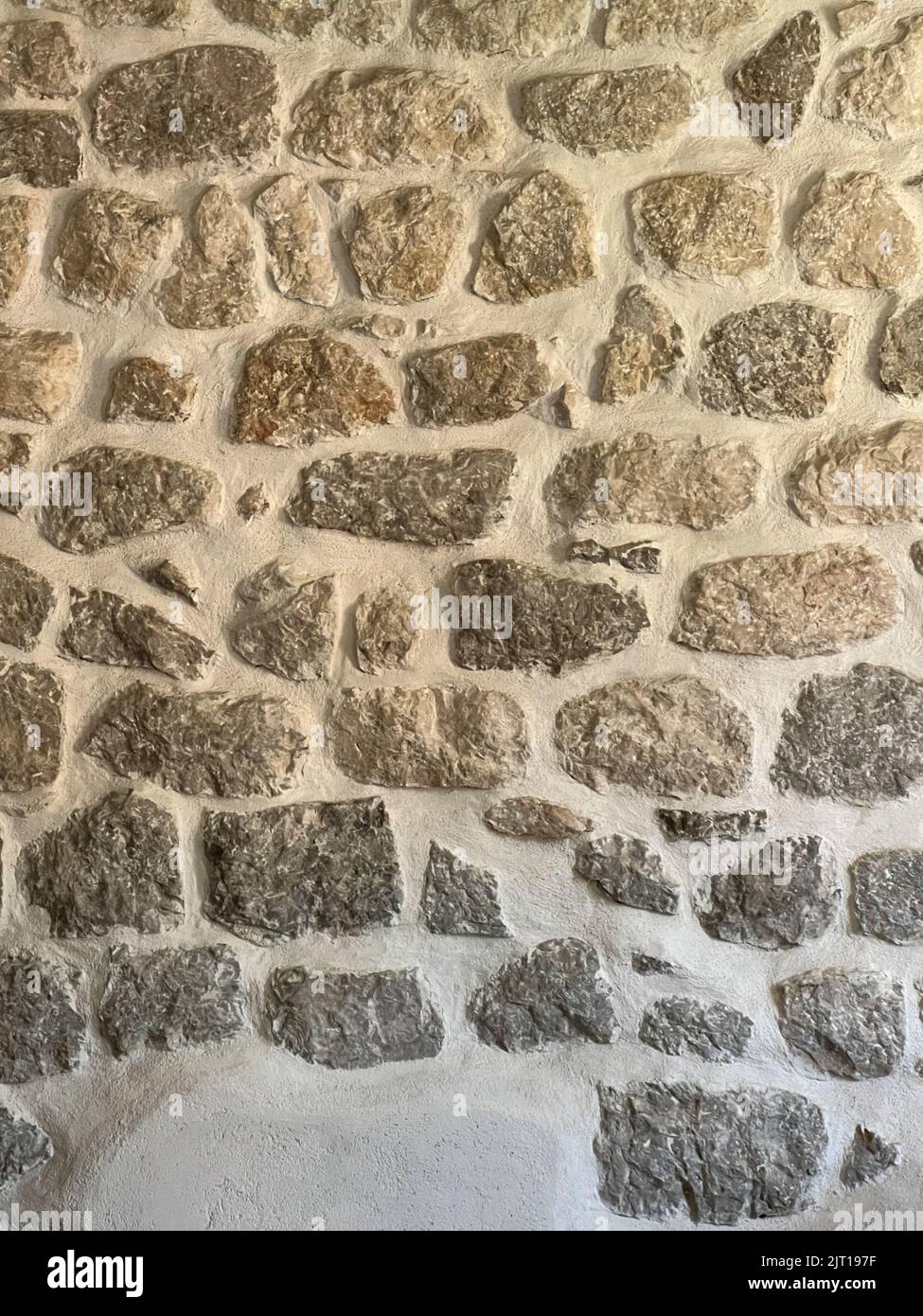 Alte gemauerte Wand des Gebäudes. Nahaufnahme Stockfoto