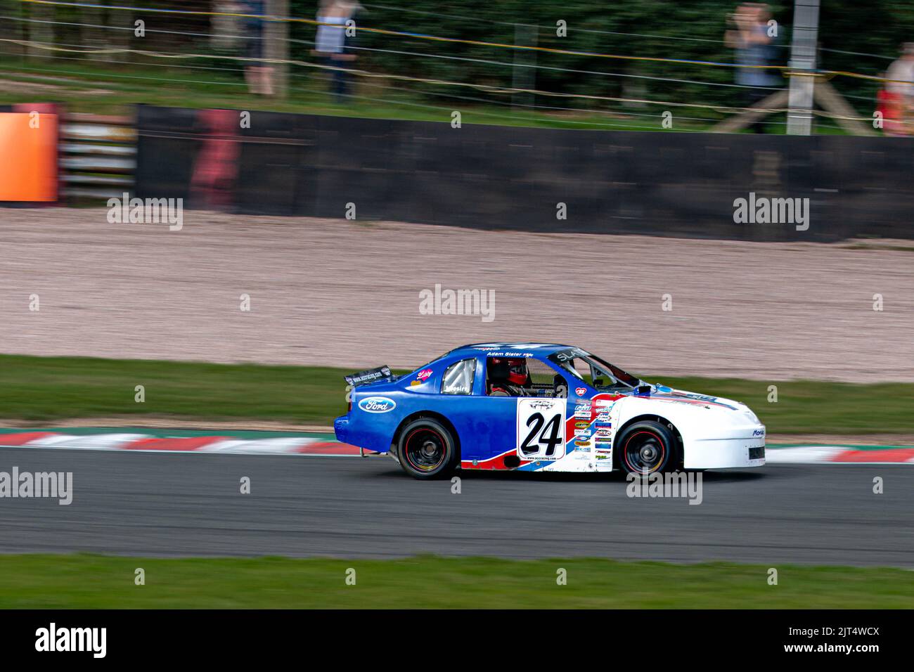 Statische und Rennbilder von der US USA Auto Show auf dem Oulton Park Raceway Chishire, einschließlich der Herzöge von Hazard und Days of Thunder Stockfoto