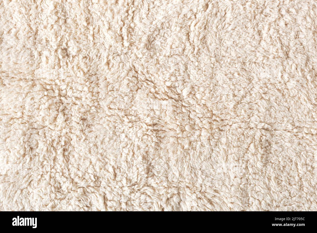 Beige weichen ökologischen Pelz Textil Hintergrund, Flatlay Stockfoto