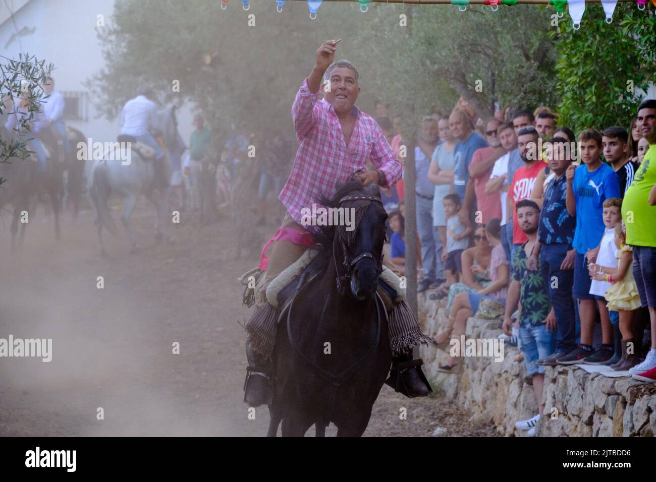 Carrera de Cintas a Caballo auf der Comares Sommer Feria, Axarquia, Malaga, Andalucía, Spanien Stockfoto