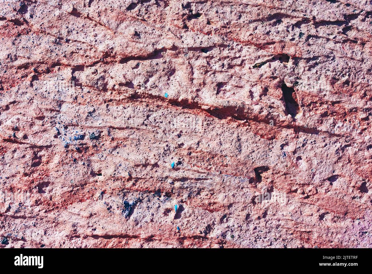Abstrakter Hintergrund, rosa Betonwand Textur. Platz für Text kopieren, Draufsicht. Stockfoto