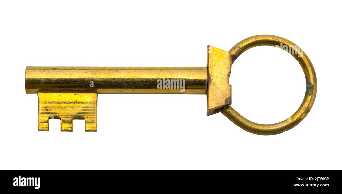 Old Brass Skeleton Key auf Weiß ausgeschnitten. Stockfoto