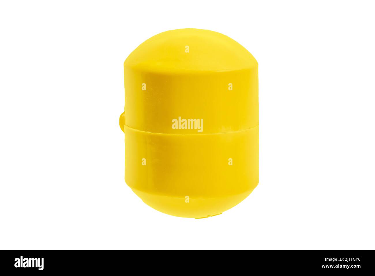 Gelbe Kapsel Überraschungskinder isoliert auf weißem Hintergrund Stockfoto