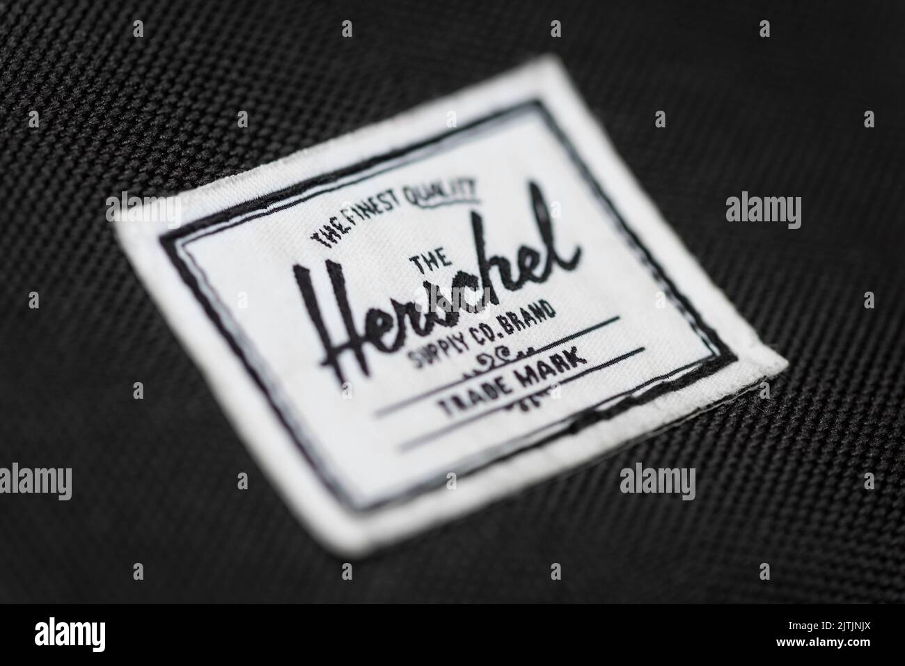 Eine Nahaufnahme des Herschel-Labels, wie sie auf einem Produkt zu sehen ist. Stockfoto