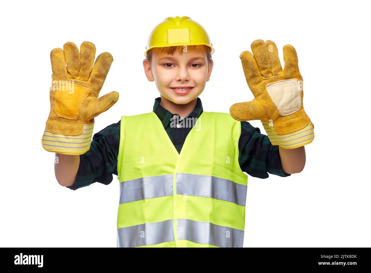 Boy in Schutzhelm, Handschuhe und Schutzweste Stockfoto