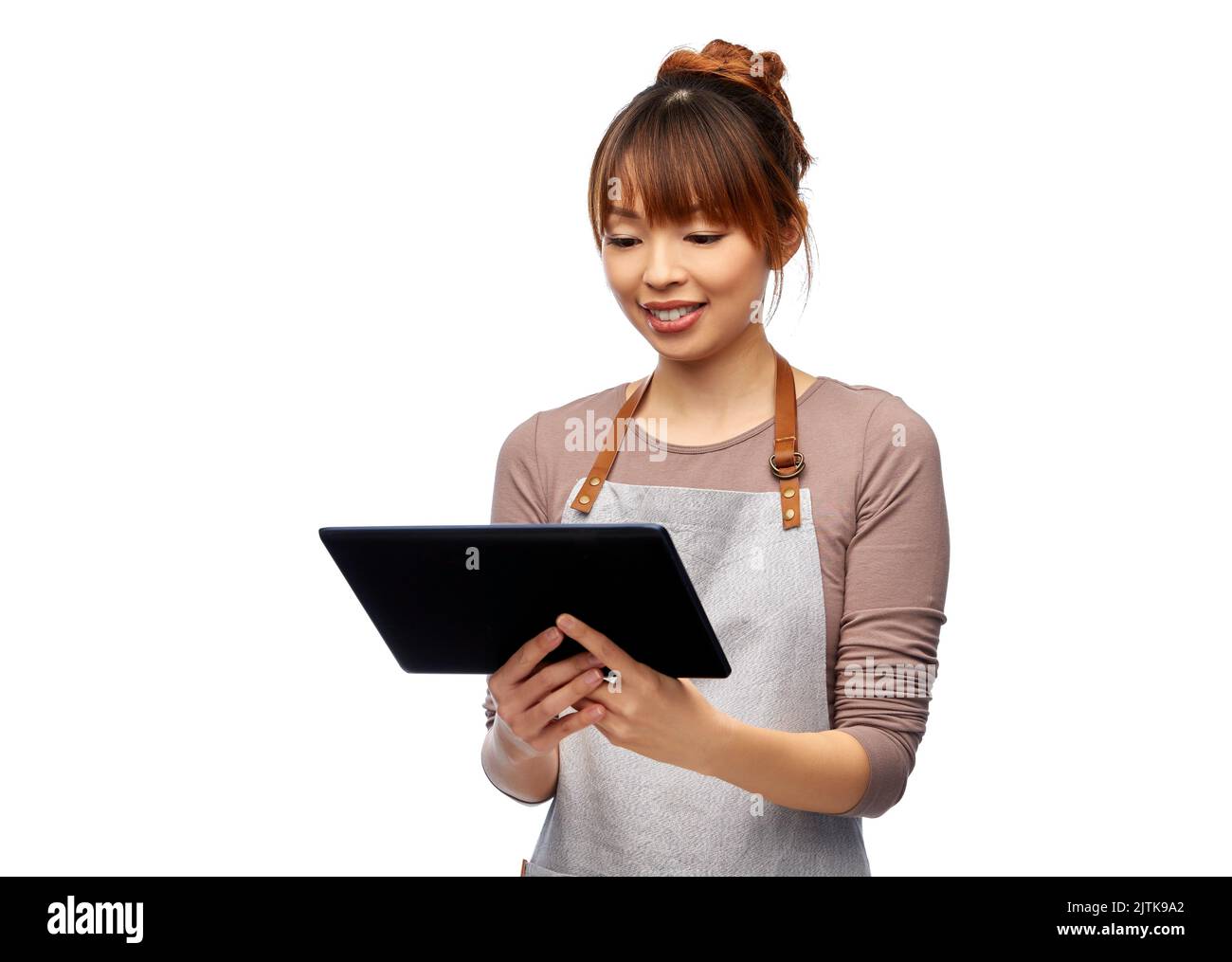 Glückliche Frau im Vorfeld mit Tablet-pc-Computer Stockfoto