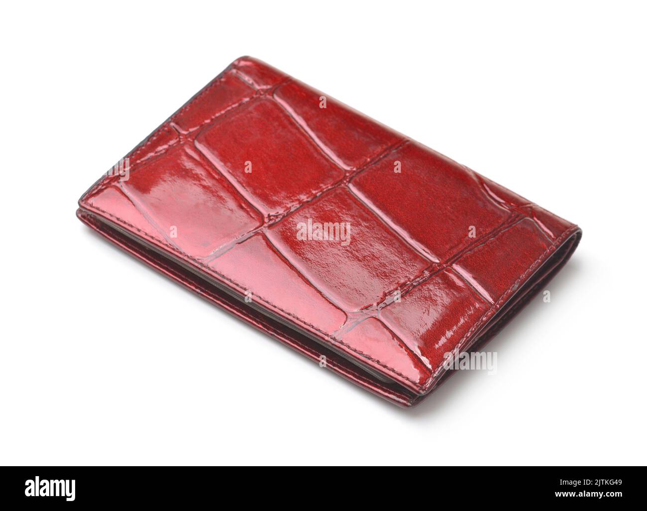 Kartenhalter aus rotem glänzendem Leder, isoliert auf Weiß Stockfoto