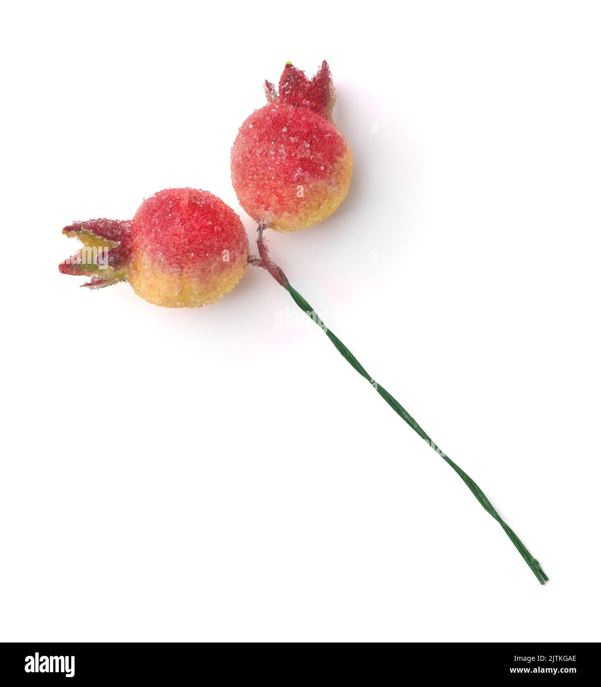 Künstliche Mini Granatapfel Früchte für weihnachtsdekoration isoliert auf weiß Stockfoto