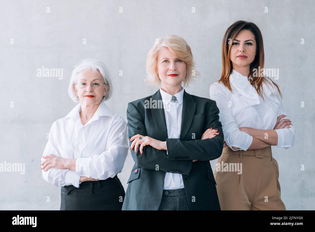 Erfolgreiche Geschäftsfrauen ehrgeiziges weibliches Team Stockfoto