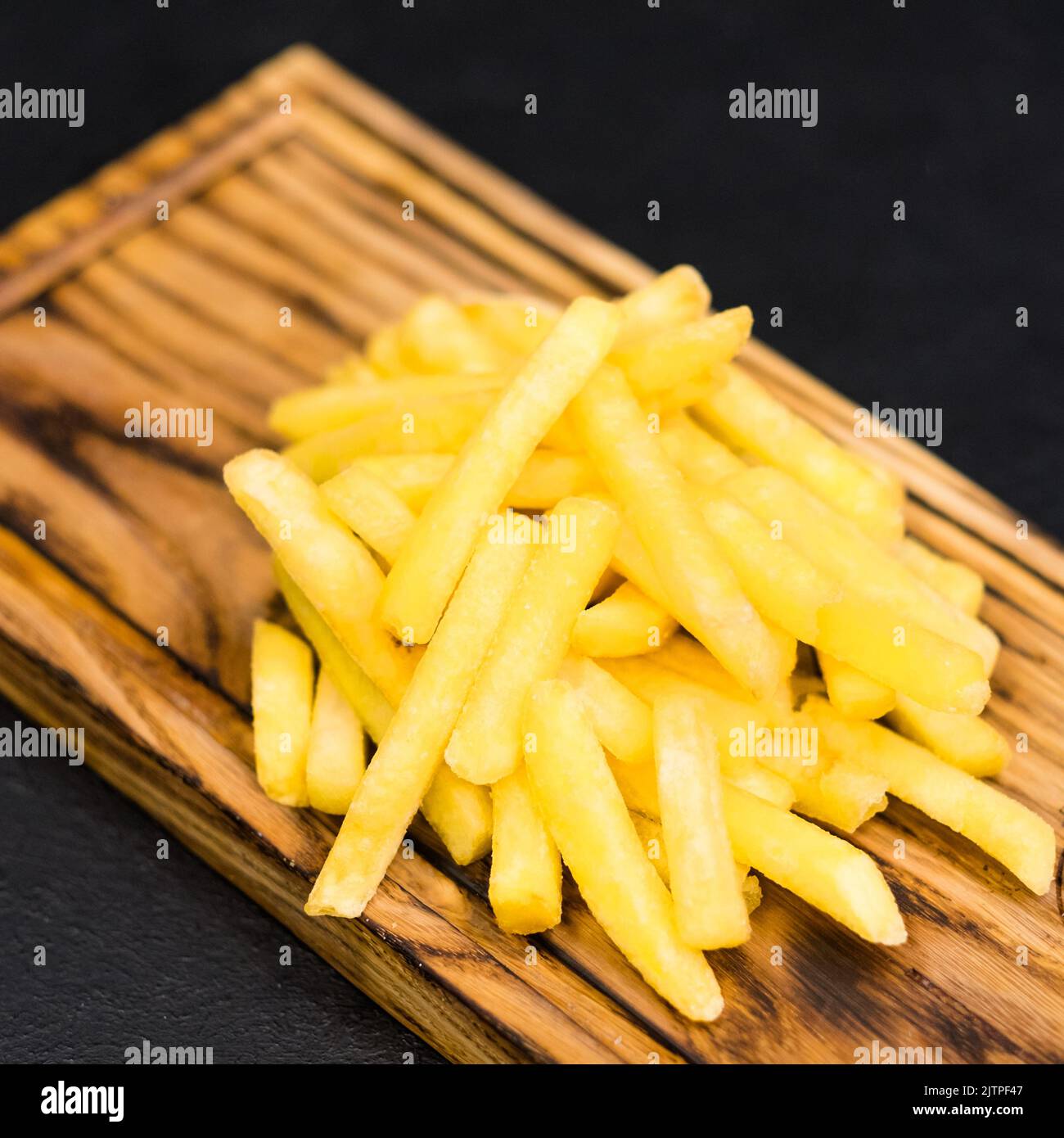 Fastfood-Menü gesalzene pommes frites Holzbrett Stockfoto