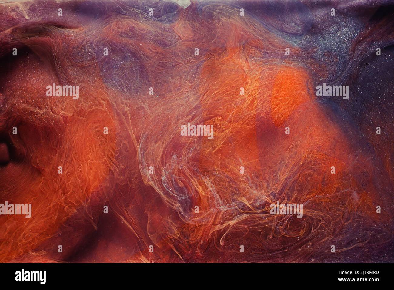 Smoke Leck verzauberte Energie lila orange Glitter Stockfoto