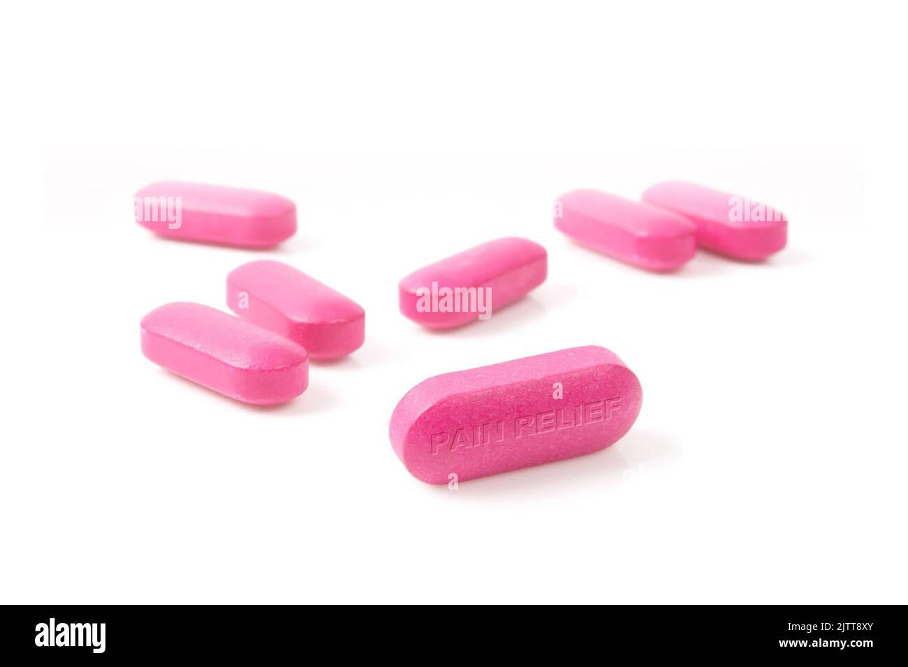 Pillen Ibuprofen auf weißem Hintergrund verstreut Stockfoto