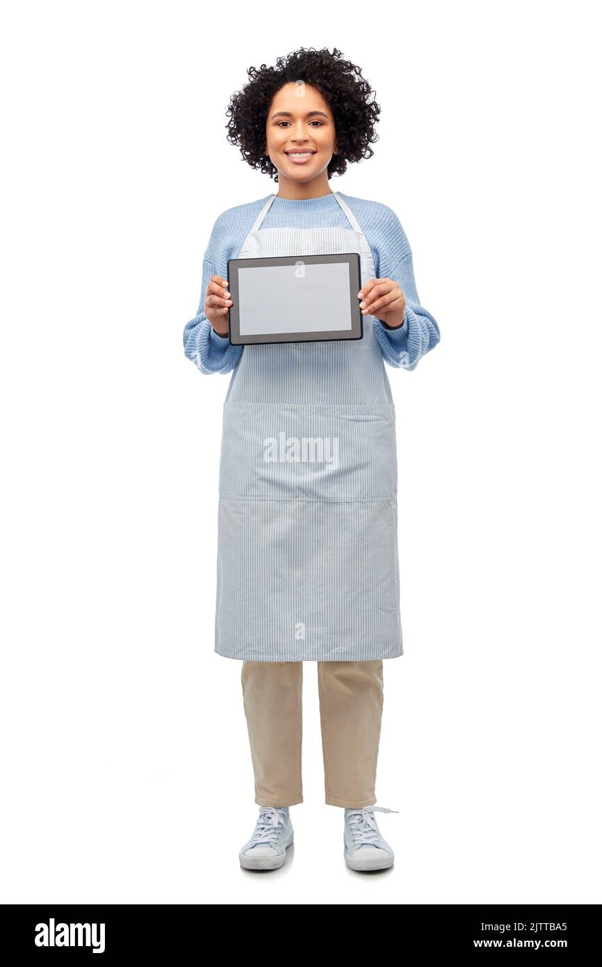 Lächelnde Frau im Vorfeld mit Tablet-pc-Computer Stockfoto