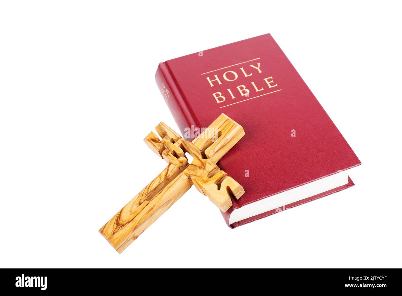 Bibel mit Holzkreuz isoliert auf weißem Hintergrund Stockfoto