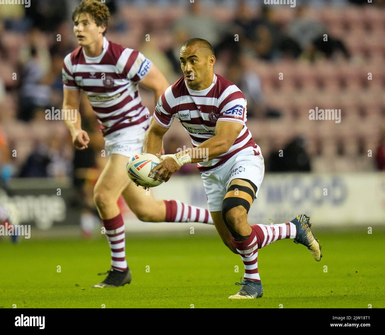 Wigan, Großbritannien. 02. September 2022. Thomas Leuluai #7 von Wigan Warriors während des Betfred Super League Spiels Wigan Warriors gegen Catalans Dragons im DW Stadium, Wigan, Großbritannien, 2.. September 2022 (Foto von Steve Flynn/Nachrichtenbilder) in Wigan, Großbritannien am 9/2/2022. (Foto von Steve Flynn/News Images/Sipa USA) Quelle: SIPA USA/Alamy Live News Stockfoto